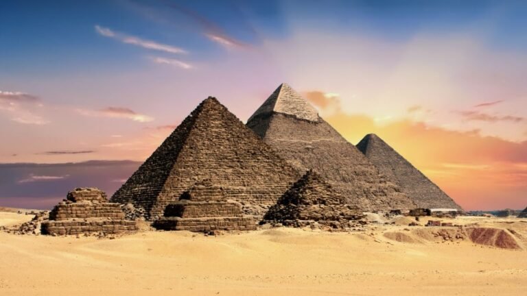 HOLISTIC EGYPT Pyramids of Giza at sunset, Cairo, Egypt
